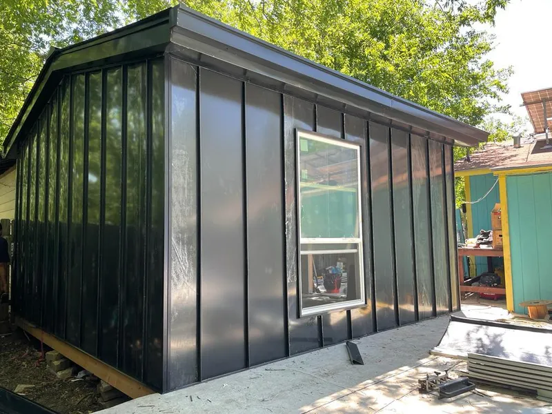 Black standing seam metal wall panels for Roof Inspection in Weehawken